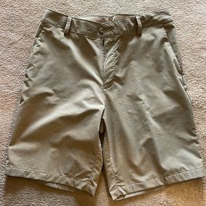 Under Armour golf shorts with a pint stripe